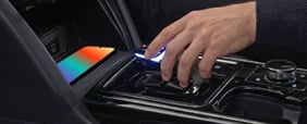 Place your device on the wireless charging pad and press the Start button to start the vehicle.